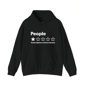 A black hoodie with white text and stars on it.