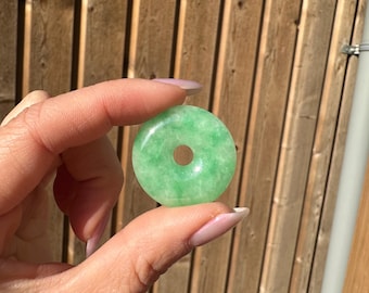 Antique jadeite donut, apple green color. Natural, untreated jadeite