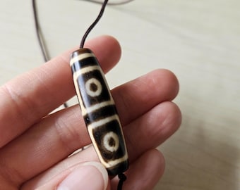 Worn Tibetan dzi bead, vintage dzi, 4 eyes dzi