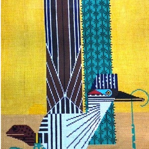 May include: A stylized illustration of a roadrunner bird with a long, thin beak, standing next to a tall, blue and brown striped cactus and a green cactus with a white flower pattern. The bird is white with black stripes and a blue head with a red beak. The background is a yellow color.