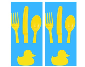 May include: Two sets of yellow plastic cutlery, each set includes a fork, knife, and spoon. Below each set is a yellow rubber duck.
