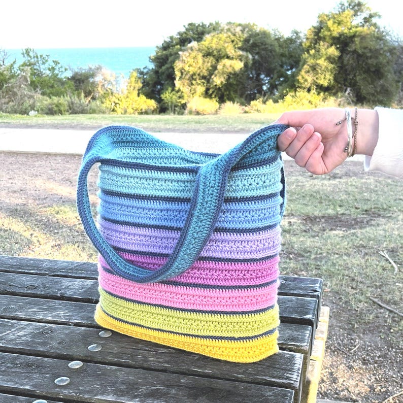 Aurora Stardust Reversible Tote Bag crochet pattern – digital PDF pattern for a stylish, two-in-one handmade tote bag. Features a colorful, textured stitch design with clear step-by-step instructions and photo guides. Perfect for everyday use, shopping, or as a unique gift. This easy-to-follow crochet pattern is beginner-friendly and instantly downloadable. A fun and creative DIY bag project for crochet lovers