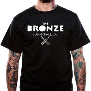 Camiseta de bronce de Buffy Cazavampiros, camiseta unisex Uneek
