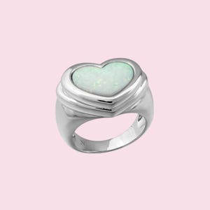 Extra chunky silver dome ring bathed in rhodium with heart-shaped white gilson opal. Chubby 15mm thick ring developed by Maison Noora