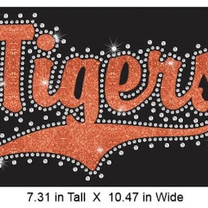 Tigers Swoosh Rhinestone Combo Transfer ready to heat apply.  You select Glitter color surrounded by BEAUTIFUL clear Rhinestones.