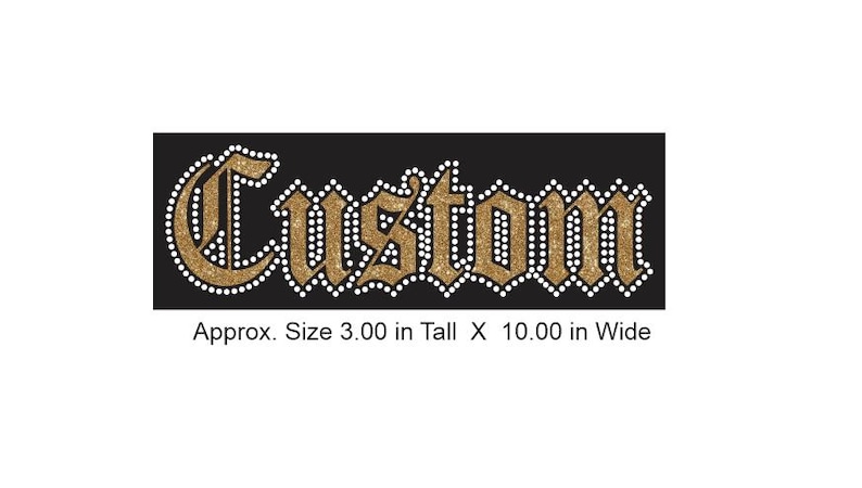 May include: Gold glitter "Custom" text with white rhinestone accents on a black background. Approx. Size 3.00 in Tall X 10.00 in Wide
