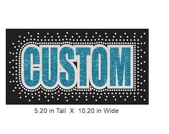 May include: A black background with white dots surrounding a blue glitter "CUSTOM" text in a white rectangle. The text is 5.20 inches tall and 10.20 inches wide.