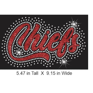 May include: A red glittery script text reading Chiefs surrounded by a dense pattern of clear rhinestones on a black background. The design measures 5.47 inches tall by 9.15 inches wide and includes three starburst accents within the rhinestone border.