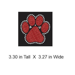 May include: Red glitter paw print with white rhinestone accents on a black background. 3.30 in Tall X 3.27 in Wide.