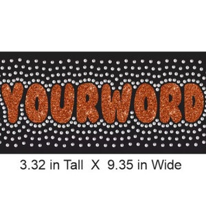 May include: Orange glitter "YOURWORD" text on a black background with a white rhinestone pattern. The design is 3.32 inches tall and 9.35 inches wide.