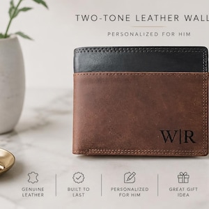 May include: A two-tone leather wallet featuring a brown main body and a black top panel. The wallet is embossed with the initials W|R in the bottom right corner. Text above reads TWO-TONE LEATHER WALLET and PERSONALIZED FOR HIM.