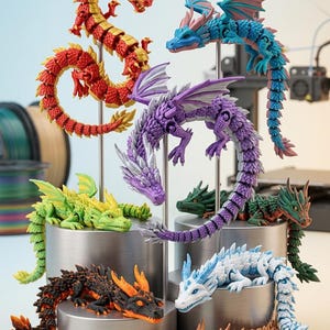 May include: A collection of colorful, 3D-printed articulated dragon models. Dragons in red, yellow, blue, purple, green, black, white, and brown are displayed on metal stands. The text "FLEXI-DRAGON COLLECTION - 3D PRINTED ARTICULATED MODELS" is visible.