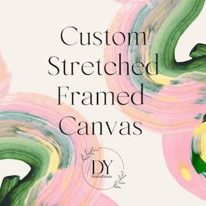 May include: Custom Stretched Framed Canvas text on a cream background. The background features abstract brushstrokes in pink, green, and yellow. The StudioPrints logo is at the bottom, with the initials DY inside a circle.