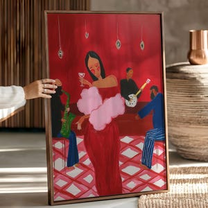 May include: A framed art print depicts a jazz club scene. A woman in a red dress and pink boa holds a wine glass. Musicians play saxophone and guitar. The background is red with diamond-patterned flooring.