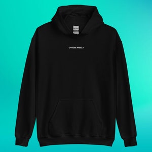 May include: Black hooded sweatshirt with a front pocket and the text "CHOOSE WISELY" in white.