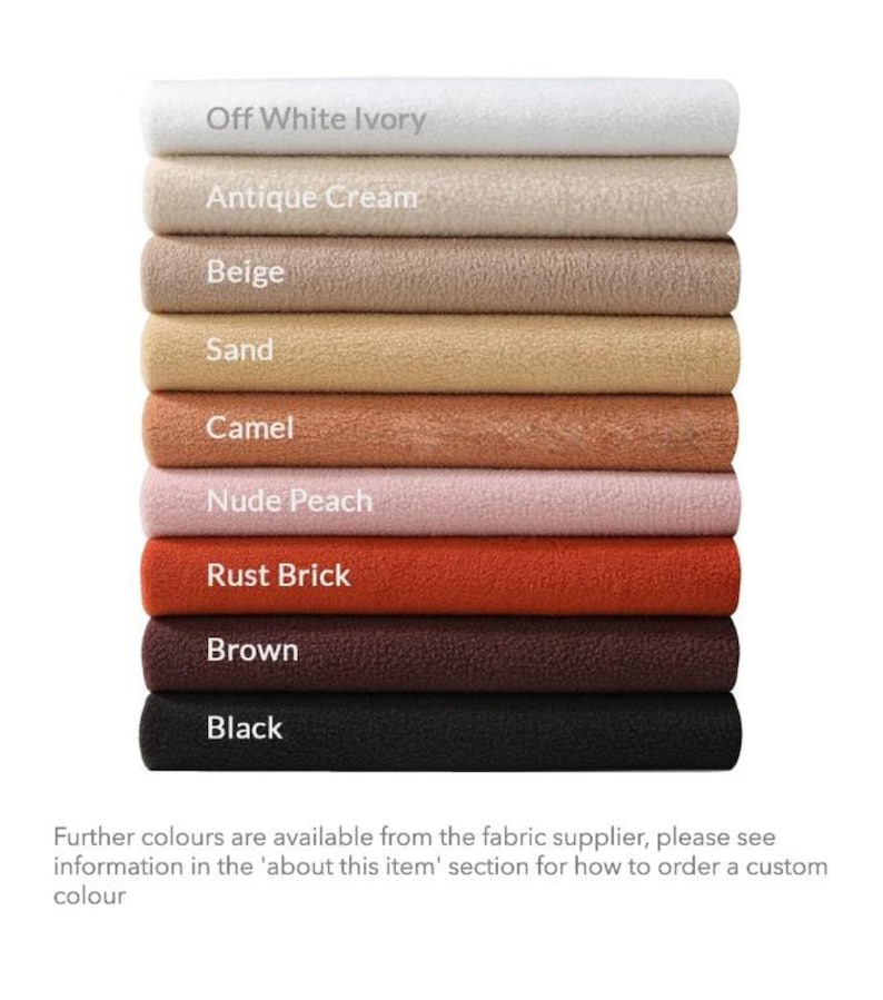 May include: A stack of fabric swatches in various shades of brown, beige, and white. The swatches are labeled with the following colors: Off White Ivory, Antique Cream, Beige, Sand, Camel, Nude Peach, Rust Brick, Brown, and Black. Further colors are available from the fabric supplier, please see information in the 'about this item' section for how to order a custom color.