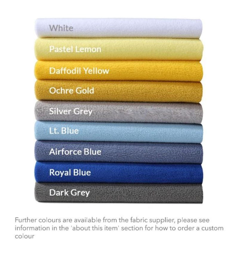 May include: A stack of fabric swatches in various colors, including white, pastel lemon, daffodil yellow, ochre gold, silver grey, light blue, airforce blue, royal blue, and dark grey. The text "Further colours are available from the fabric supplier, please see information in the 'about this item' section for how to order a custom colour" is at the bottom of the image.