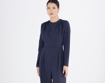 Elegante donkerblauwe jumpsuit: wijde pijpen geplooid, speciale gelegenheden