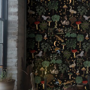 May include: Black wallpaper with a repeating pattern of whimsical forest creatures, mushrooms, and stars. The pattern includes a variety of animals, including birds, rabbits, and mythical creatures. The wallpaper is perfect for adding a touch of whimsy and magic to any room.