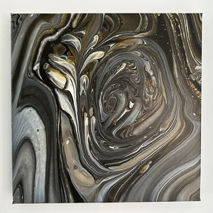 May include: Abstract painting with swirling black, white, and gold paint. The colours create a dynamic and eye-catching design.