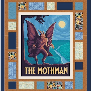 May include: A rectangular quilt featuring a central panel with a Mothman illustration, the text THE MOTHMAN, and a full moon. The border consists of a patchwork design with brown, navy blue, and light blue fabric squares and printed graphic motifs.