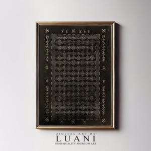 May include: Framed digital art print featuring a black background with a detailed, symmetrical white pattern. The artwork is enclosed in a gold-colored frame. The text "DIGITAL ART BY LUANI HIGH-QUALITY PREMIUM ART" is displayed at the bottom.
