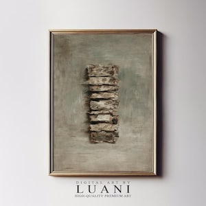 May include: Abstract art print in a gold frame. The artwork features a vertical stack of textured, rectangular shapes in shades of brown and beige against a muted green background. The bottom of the frame includes the text "DIGITAL ART BY LUANI HIGH-QUALITY PREMIUM ART."