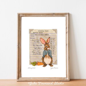 May include: A vintage-style library card with a brown rabbit illustration. The card lists the book "Tale of Peter Rabbit" by Beatrix Potter and includes the publication dates of various editions.