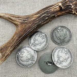 May include: Four silver-toned buttons with a raised design of a double-headed eagle and the text "GALLODILURES HUNG ROH TOMBEIVEN AA1859".