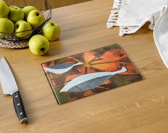 Glass cutting board birds at sunset