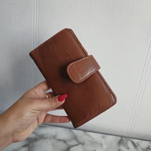 Vintage genuine leather wallet, card holder with button retro classic timeless.