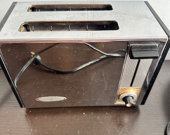 Vintage General Electric vintage chrome 2 slice toaster.