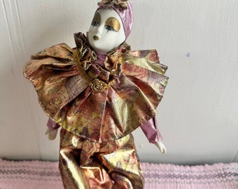 Vintage Pierrot Clown Doll Porcelain Head Arms Feet pink & Golden Metallic Costume.