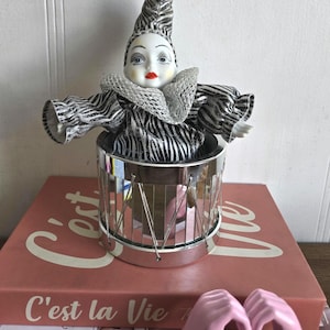 jouet mécanique ancien clown jouant du saxophone Saxy Walker Clown Joja Toys