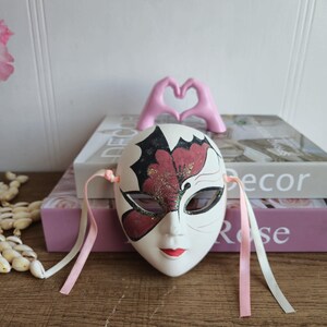 Vintage hand painted white matte MASK hanging black  peach shimmering theatrical.