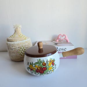 Vintage fondue pot with fruit design, colorful design white pot, brown lid, wooden knob and handle, mid century modern, vintage kitchen