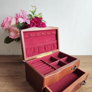 Vintage jewelry box with red velvet.