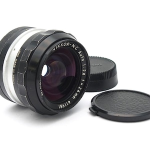 Vintage Nikon Nikor-N.C Auto 24mm F2.8 Wide Angle Lens - Nikon F Mount - with Caps