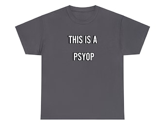 May include: A dark gray t-shirt with the text "THIS IS A PSYOP" printed in white.