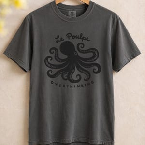 Pepper folded Comfort Colors overthinking octopus shirt.
