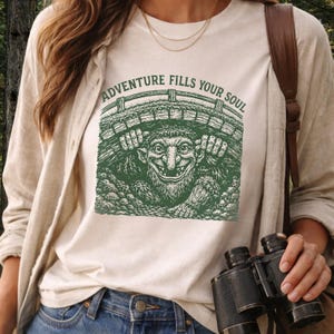 Könnte beinhalten: Ein Set aus drei Keramikbechern mit gesprenkelter, matter Oberfläche. Die Becher sind in Creme-, Hellgrau- und Dunkelgrautönen gehalten. Jeder Becher hat ein schlichtes, minimalistisches Design.