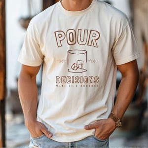 For the bourbon lovers! POUR DECISIONS (make it a bourbon) with a simple distressed line drawing of a whiskey glass with two ice-cubes.