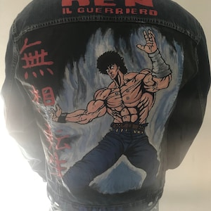 May include: A blue denim jacket with a hand-painted design on the back. The design features a muscular man with a fiery background and the text "KEN IL GUERRIERO" in red. The text "無敵" is written in black on the left side of the design.