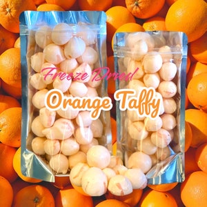 Gefriergetrocknete orange Salzwasser Toffee, köstliche Leckereien, hausgemachte lustige Taffy Bombs, getrocknete Süßigkeiten, gefriergetrocknete Snacks