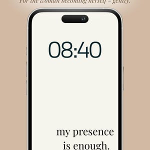 May include: A smartphone screen displays the time 08:40 in a dark teal font. The screen also features the text "A daily return to self. For the woman becoming herself - gently." and "my presence is enough."