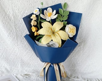 May include: A bouquet of crocheted flowers in shades of yellow and white, wrapped in blue paper and tied with a yellow ribbon. The ribbon has the text "Just for you" printed on it.