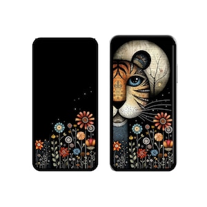 Peut inclure: Deux coques de téléphone rectangulaires avec un fond noir et un champ de fleurs stylisées et colorées en bas. La coque de droite présente un grand visage de tigre détaillé aux yeux bleus et aux motifs complexes devant une lune circulaire.