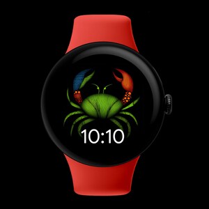 Könnte beinhalten: Eine schwarze Smartwatch mit rotem Armband zeigt einen grünen Krebs auf dem Bildschirm. Der Krebs hat blaue und orangefarbene Scheren. Die Uhrzeit 10:10 wird in Weiß angezeigt. Die Uhr hat ein rundes Zifferblatt.