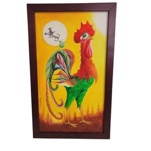 May include: A framed painting of a rooster with a red head and comb, green legs, and a colorful tail. The background is yellow with a white circle and a black silhouette. The frame is dark brown.