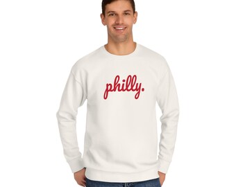 May include: White sweatshirt with a red "philly." graphic.